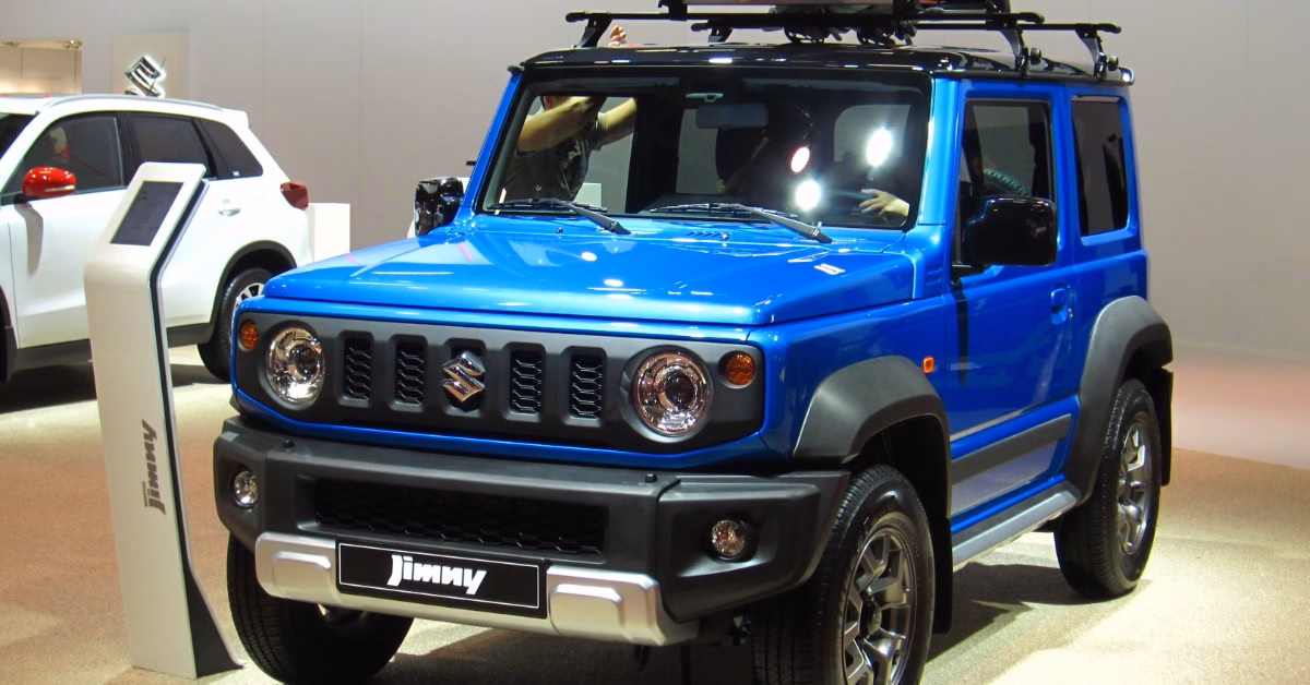 Current Suzuki Jimny Sierra in blue with a roof rack