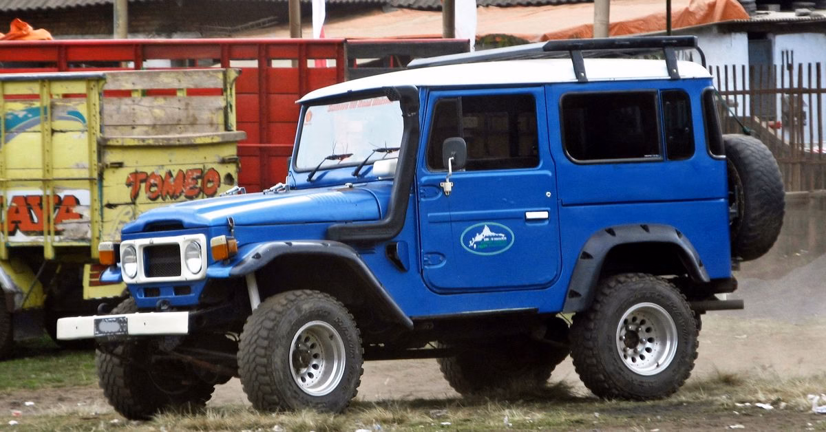 Toyota FJ40 Land Cruiser hardtop in blue with a white roof