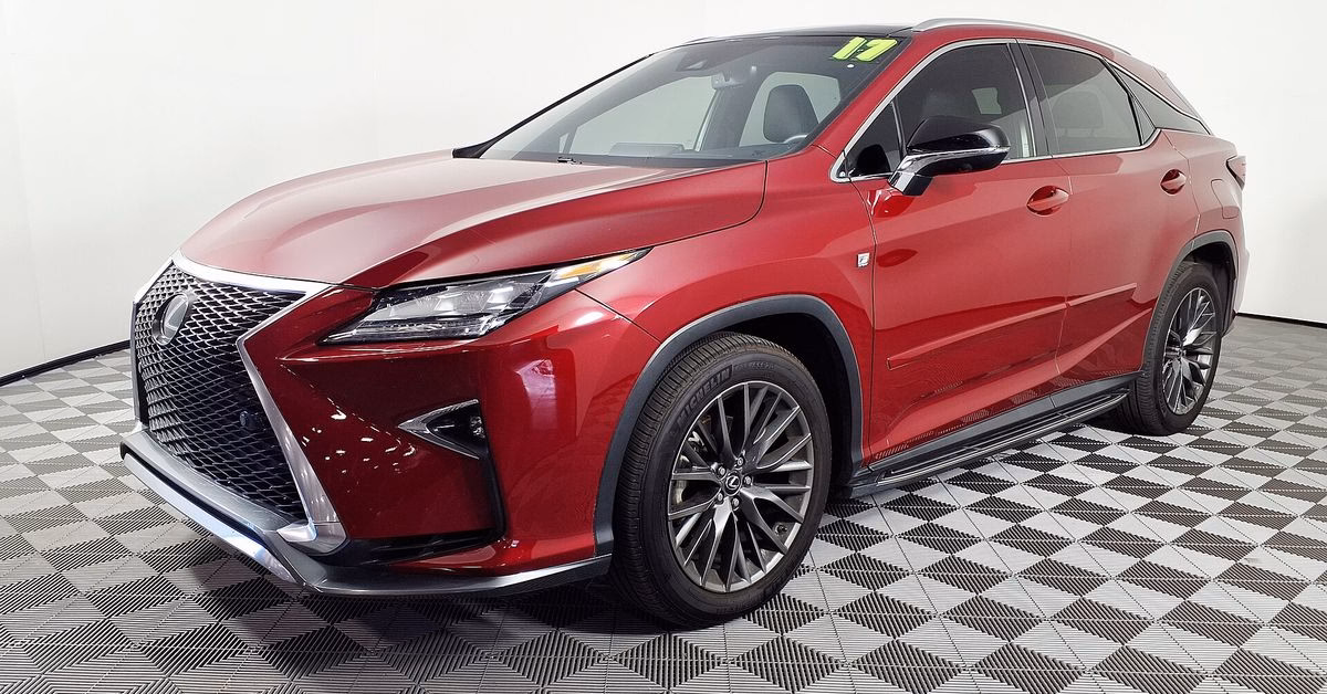 Red Lexus RX 350 F Sport seen from the front right